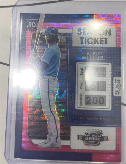 2022 Panini Chronicles Contenders Optic #19 Bobby Witt Jr. Pink Pulsar Season Ticket RC — front