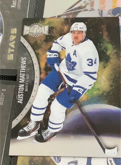 2021-22 Skybox Metal Universe #25 Auston Matthews — front