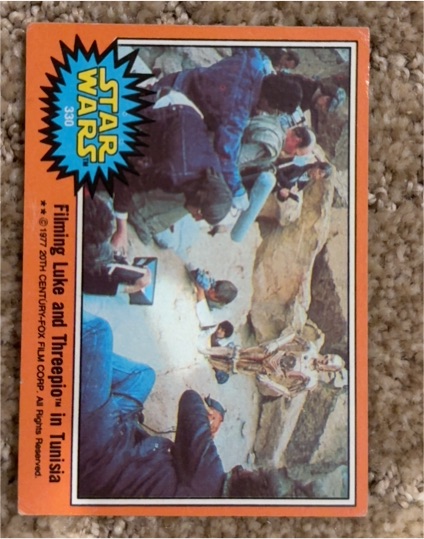 1977 Topps Star Wars Series 5 Orange #330 Filming Luke & Threepio In Tunisia — front