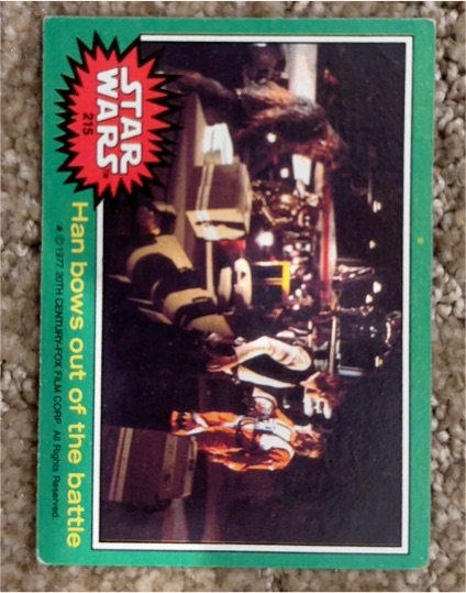 1977 Topps Star Wars #215 Han Bows Out Of The Battle — front