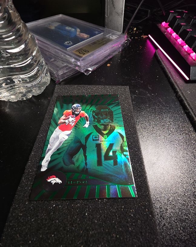2024 Panini Illusions #23 Courtland Sutton Emerald Trophy Collection — front