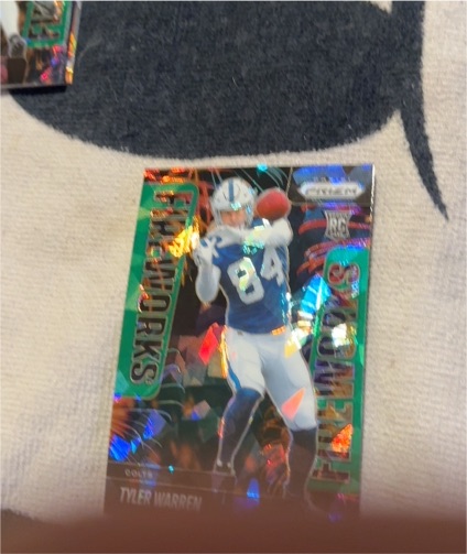 2025 Panini Prizm Fireworks #12 Tyler Warren Rookie Card — front