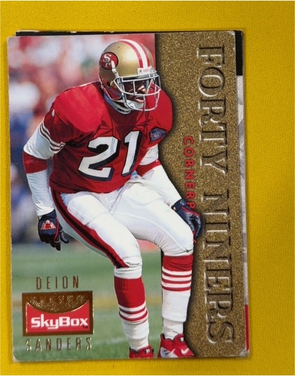 1995 SkyBox Premium #120 Deion Sanders — front