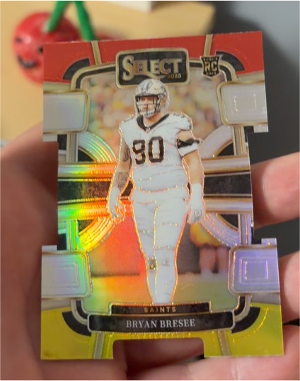 2023 Panini Select #72 Bryan Bresee Red and Yellow Prizm Die Cuts Die-Cut Rookie — front