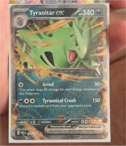2011 Pokémon Black & White #64 Tyranitar ex — front