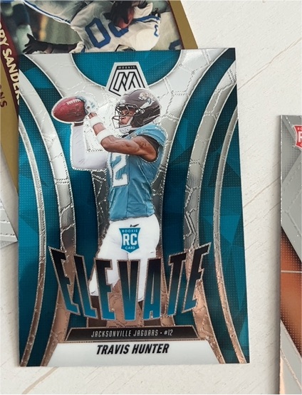 2022 Panini Mosaic #12 Travis Hunter — front
