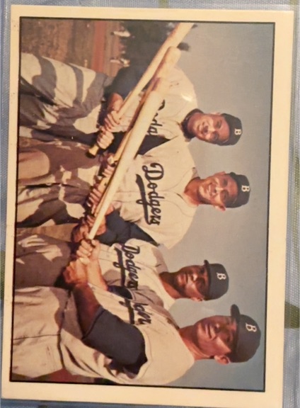 1955 Topps #311 Brooklyn Dodgers Infielders Jackie Robinson Roy Campanella Don Newcombe Pee Wee Reese — front