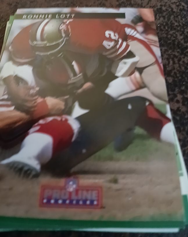 Pro Line Portraits Ronnie Lott Football Card — front