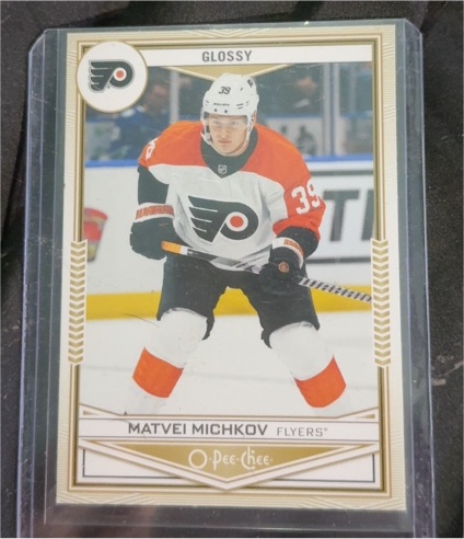 2023 O-Pee-Chee #GLOSSY Matvei Michkov — front
