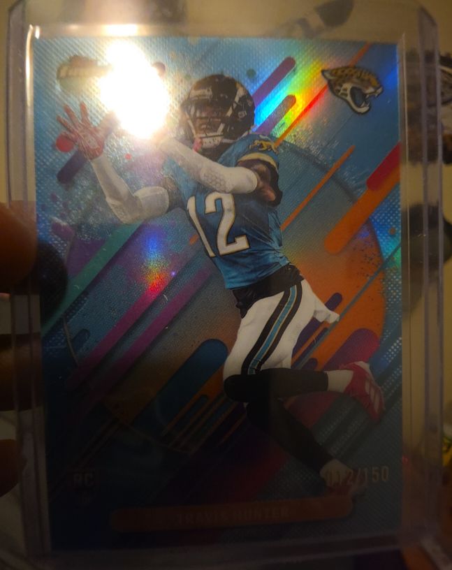 2021 Donruss Optic #102 Travis Etienne — front