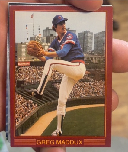 1989 Classic Travel Orange #121 Greg Maddux — front