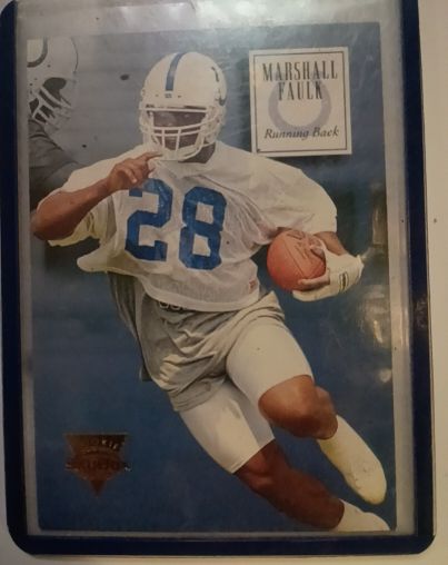 1994 SkyBox Premium #158 Marshall Faulk Rookie Card — front