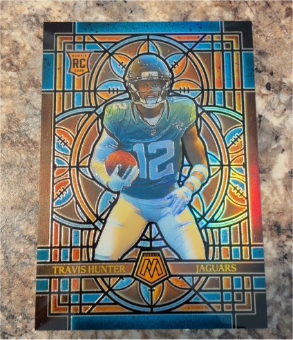 2025 Panini Mosaic Oversized Stained Glass #12 Travis Hunter — front