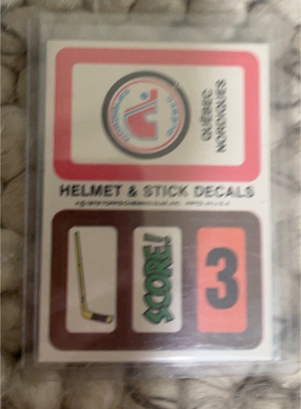 1979 Topps Hockey #3344 Quebec Nordiques Helmet & Stick Decal — front