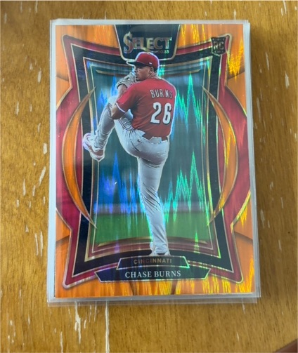 2025 Panini Select #94 Chase Burns RC Orange Shock — front