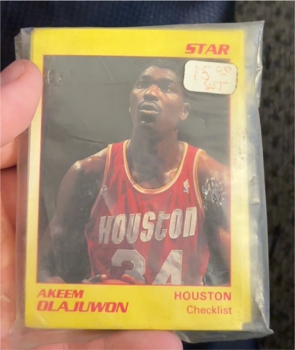1990 Star #1 Akeem Olajuwon Checklist — front
