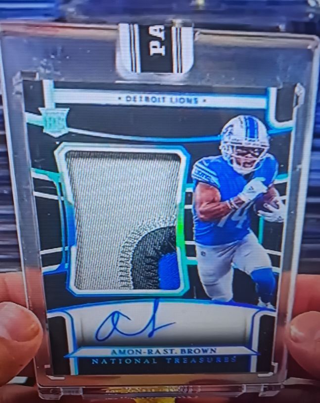 2021 Panini Obsidian #RPA-AB Amon-Ra St. Brown — front