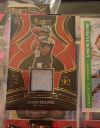 2025 Panini Select #DSM-JME Jalen Milroe Draft Selections Red Prizm Rookie Patch Seahawks — front