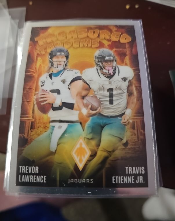 2024 Panini Phoenix Treasured Tandems #TT-JAX Trevor Lawrence, Travis Etienne Jr. — front