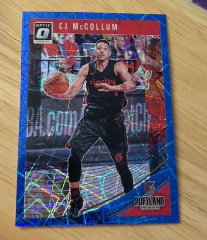 2018-19 Panini Donruss Optic #11 CJ McCollum Blue Velocity — front