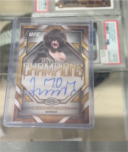 2026 Topps Chrome UFC #MOC-MD Merab Dvalishvili Marks of Champions — front