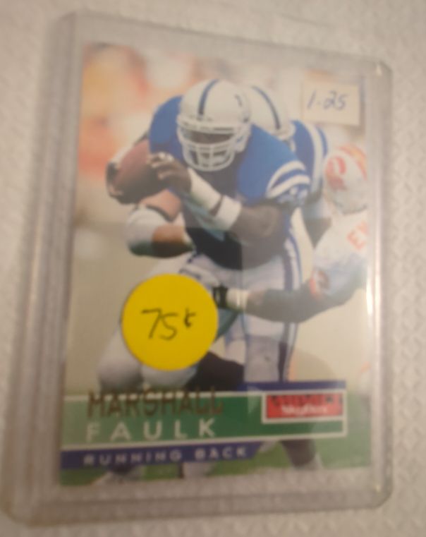 1995 SkyBox Impact #64 Marshall Faulk — front