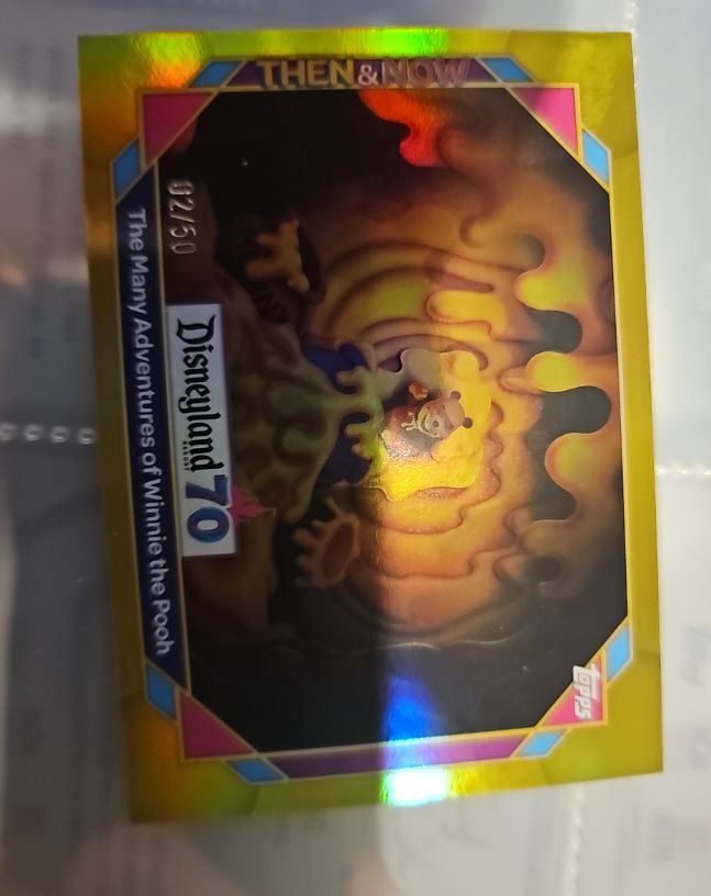 2025 Topps Disneyland 70th #23 The Many Adventures of Winnie the Pooh Then & Now — front