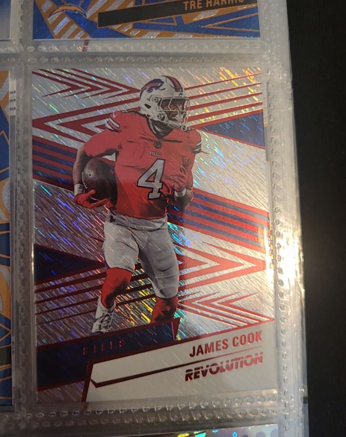 2025 Panini Revolution #112 James Cook — front