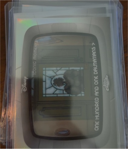 2026 Topps Chrome Disney #IM-2 Cruella's Entrance Iconic Moments — front
