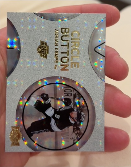 2025-26 SkyBox Metal Universe #CB-12 Adrian Kempe Circle Button — front