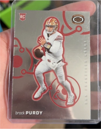 2022 Panini Chronicles Dynagon Rookies #D-2 Brock Purdy — front