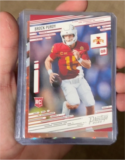 2022 Panini Chronicles Prestige #25 Brock Purdy Rookie Card — front