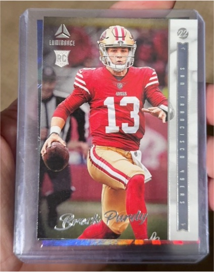 2022 Panini Chronicles Luminance Update Rookies #213 Brock Purdy — front