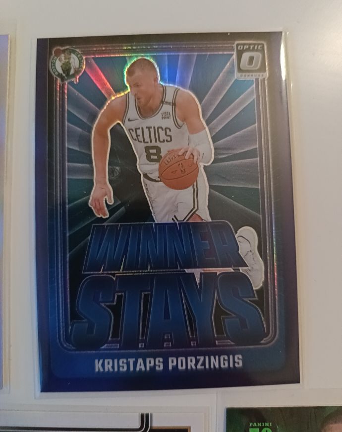 2024-25 Panini Donruss Optic #9 Kristaps Porzingis Winner Stays — front