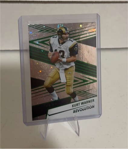 2025 Panini Revolution #185 Kurt Warner — front