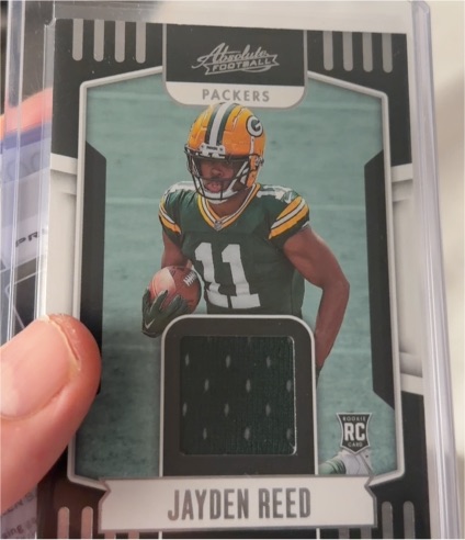 2023 Panini Absolute #ARM-15 Jayden Reed Absolute Rookie Materials — front