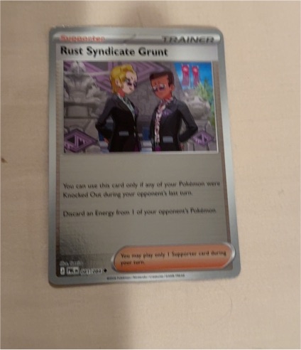 2023 Pokémon TCG Pitch Black #081 Rust Syndicate Grunt — front
