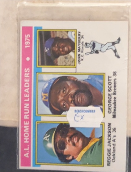 1976 Topps #194 1975 A.L. Home Run Leaders Reggie Jackson — front