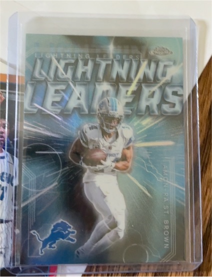 2025 Topps Chrome Lightning Leaders #LL-15 Amon-Ra St. Brown — front