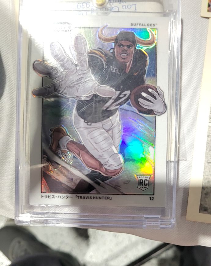 2025 Panini Draft Prizm #12 Travis Hunter Manga Case Hit Rookie — front