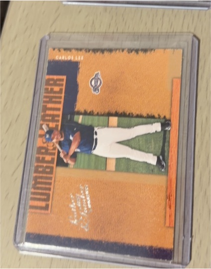 2005 Donruss Leather & Lumber #LL-5 Carlos Lee — front