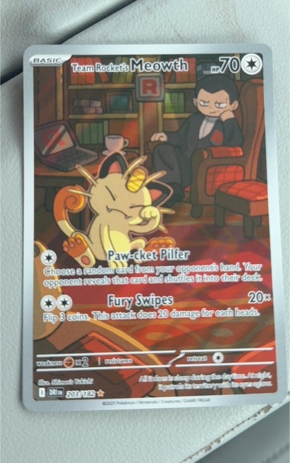 2025 Team Rocket's Meowth #203 — front