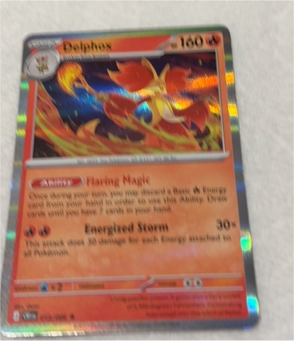 Delphox 013/086 Chaos Rising Holo Rare — front