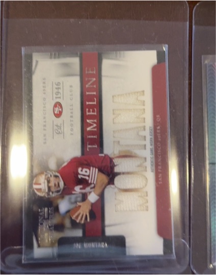 2009 Panini National Treasures Timeline #11 Joe Montana — front