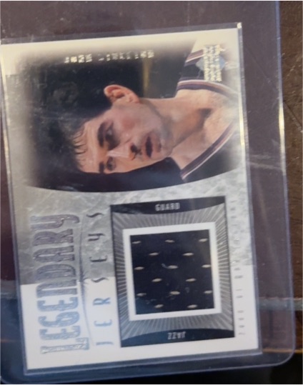 1999 Upper Deck Century Legends Jerseys of the Century #JS John Stockton — front