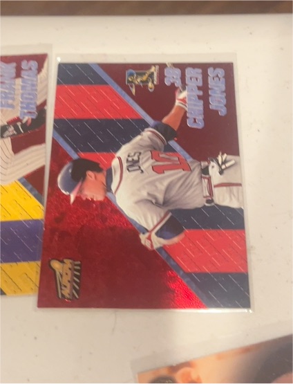 1997 Pacific Prism Invincible #79 Chipper Jones — front