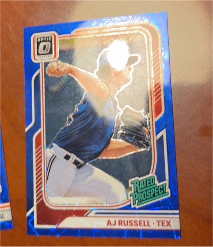 2026 Donruss Optic #106 AJ Russell Rated Prospect Blue Velocity — front