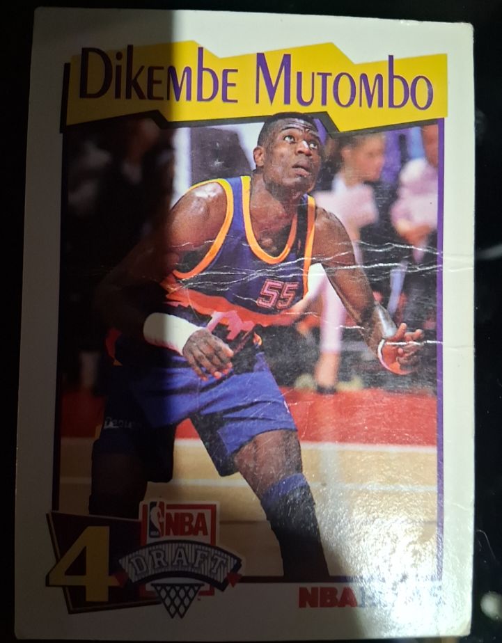 1991-92 NBA Hoops McDonald's #48 Dikembe Mutombo Rookie Card — front