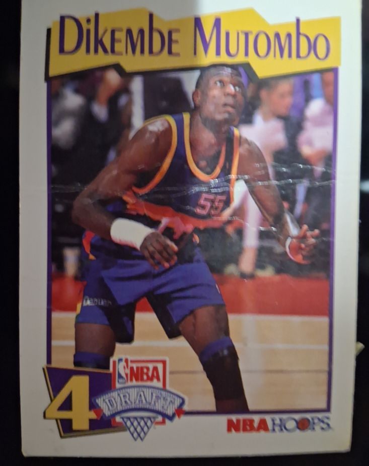 1991-92 NBA Hoops McDonald's #4 Dikembe Mutombo — front