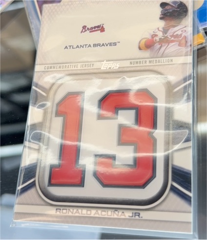 2022 Topps Commemorative Player Jersey Number Medallions #JNM-RA Ronald Acuna Jr. — front